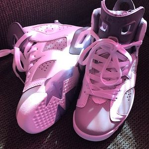 These Jordan Air 6s are a size 5.5 and has never been worn .